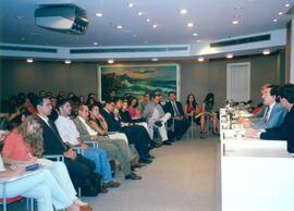 Fotografia dos ouvintes de uma palestra realizada no auditório da Associação do Ministério Públic...